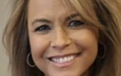 Headshot of Shannon Barnum, real estate agent at Modern Market REALTORS®, smiling portrait
