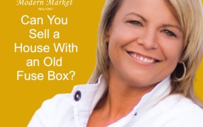 A smiling blonde woman in a white jacket stands in front of a golden-yellow background with the Modern Market REALTORS® logo beside text that reads, “Selling your house but worried about its old fuse box?