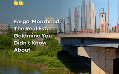Scenic view of a bridge over a river in Fargo-Moorhead, with lush greenery and a cityscape in the background, featuring the text 'Fargo-Moorhead: The Real Estate Goldmine You Didn’t Know About' and the website 'fargohomesearch.com'.