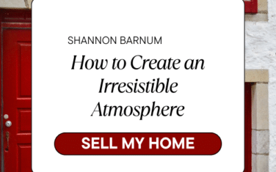 Red doors and windows on a white stone home with a promotional message from Shannon Barnum about creating an irresistible atmosphere when selling a home.