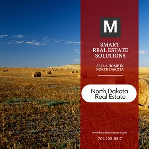 A wide North Dakota prairie landscape dotted with round hay bales under a bright blue sky, overlaid on the right by a vertical red panel featuring the Modern Market REALTORS® “M” logo, the text “SMART REAL ESTATE SOLUTIONS – SELL A HOME IN NORTH DAKOTA,” a white pill-shaped label reading “North Dakota Real Estate,” and contact details (fargohomesearch.com • 701-205-5517).
